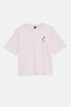 Lichtroze T-shirt van VERO MODA met borduursel van twee roze bloemen op de linkerborst.