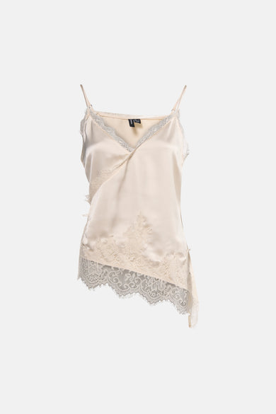 Chemisier sans manches beige de VERO MODA, orné de dentelle délicate et de détails asymétriques.
