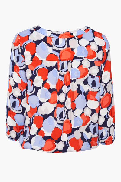 Blouse multicolore de Tom Tailor, à motif abstrait de cercles en rouge, bleu et blanc, vue de dos.