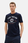 Blauw T-shirt van Tom Tailor, effen model van achteren gedragen met een bijpassende broek.