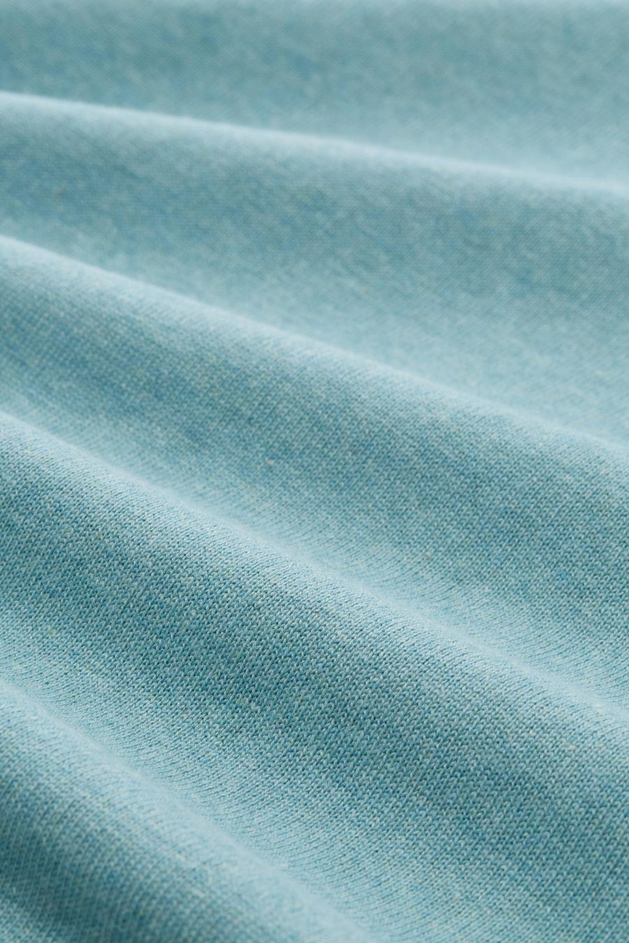 Pull à col rond bleu de Tom Tailor, en maille fine texturée avec des plis doux.