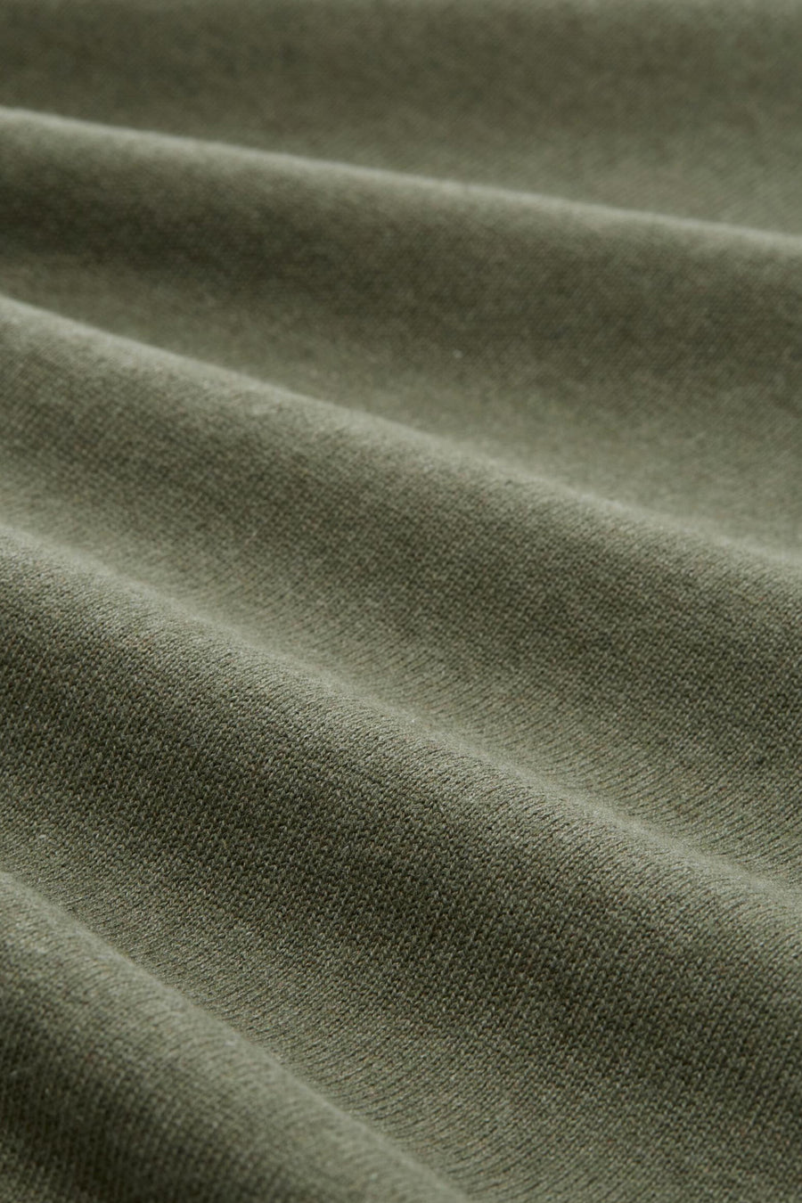 Pull à col rond vert de Tom Tailor, en tricot doux avec des plis délicats.