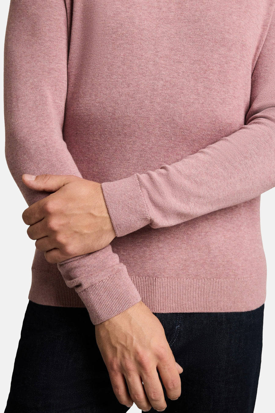 Rose-colored O-neck pullover with ribbed cuffs and hem, worn with dark jeans, front cropped view