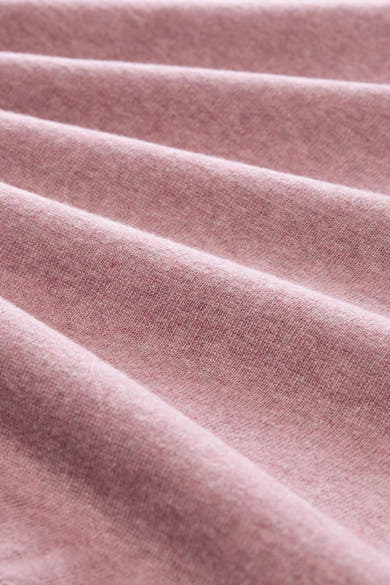 Rose-colored O-neck pullover with soft textured knit, close-up view showing fabric folds and gentle sheen