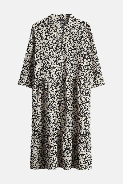 Robe à manches longues noire by OPUS avec imprimé all over et coupe évasée.
