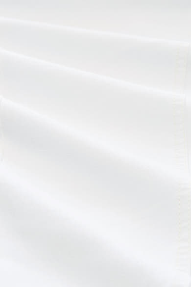 Pantalon coloré blanc de Tom Tailor, avec des plis doux et des coutures discrètes.