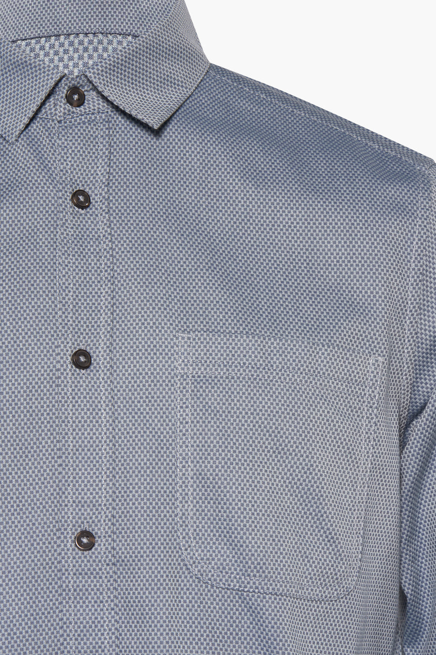 Blauwe blouse met lange mouwen van Tom Tailor met subtiel ruitpatroon en borstzak.