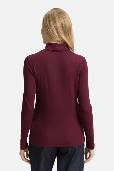 T-shirt à manches longues bordeaux de Tom Tailor, porté avec un jean, vue de dos.