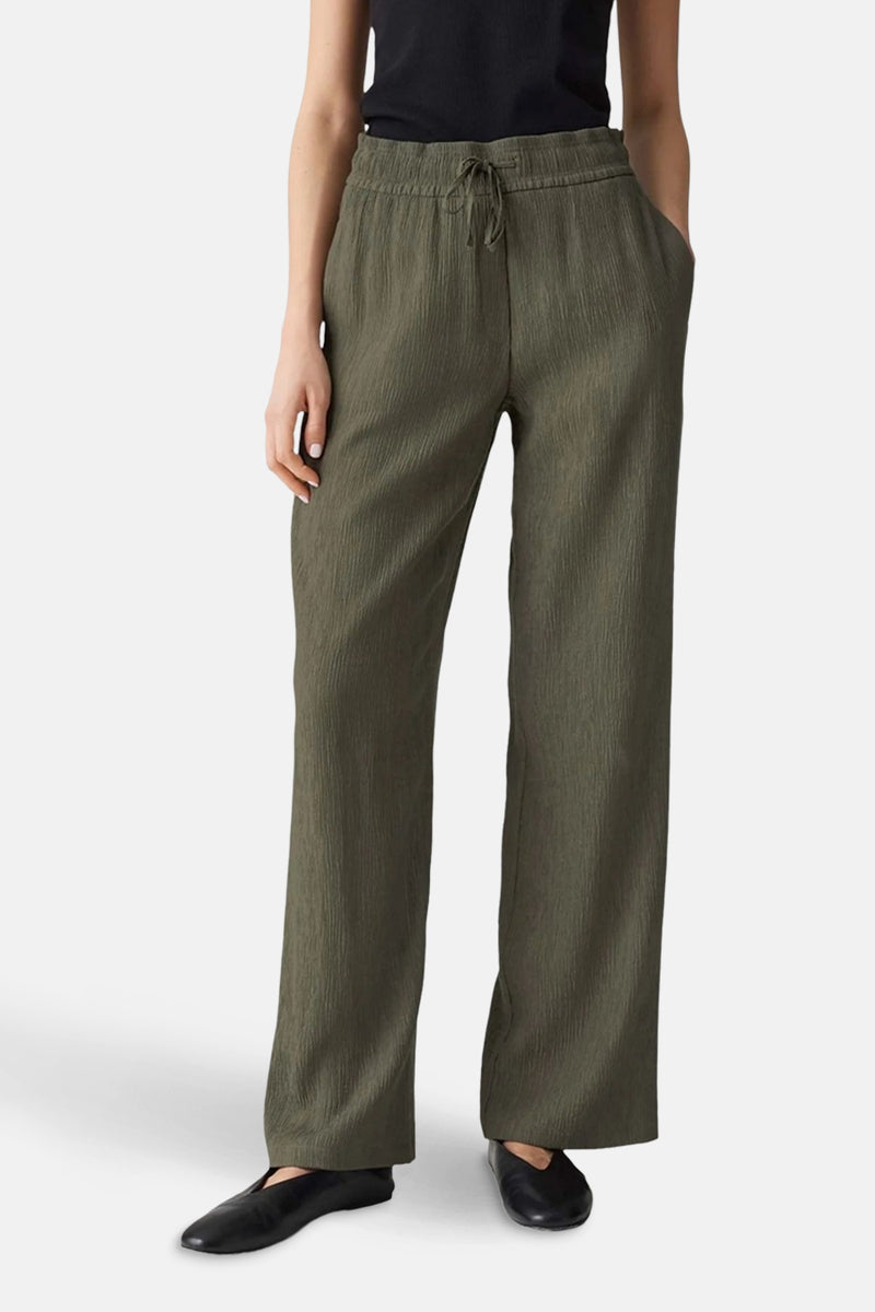 Pantalon vert ample, de OPUS, avec cordon de serrage à la taille et texture côtelée.