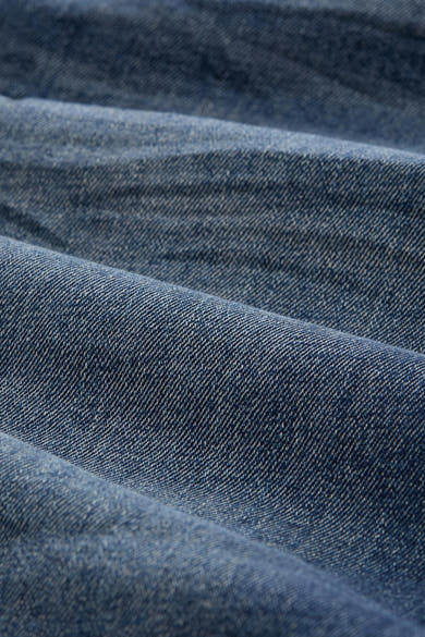 Korte donkerblauwe spijkerbroek van Tom Tailor, geplooide textuur.