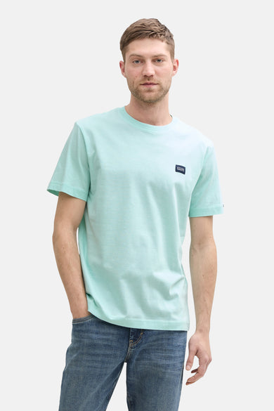 Turquoise T-shirt met korte mouwen van Tom Tailor, gedragen met een spijkerbroek