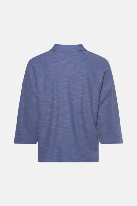 Blauwe polo met korte mouwen van Tom Tailor, met geweven textuur en een klassieke kraag, achterzijde.