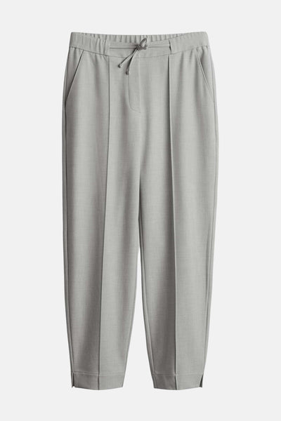 Pantalon de costume gris par OPUS, coupe décontractée avec cordon de serrage à la taille et ourlets fendus.
