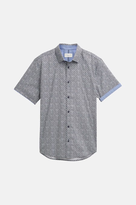 Blauw overhemd met korte mouwen van Tom Tailor, met een subtiel printpatroon en contrasterende afwerkingen aan de mouwen en kraag.