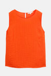 Chemisier orange sans manches de Tom Tailor, texturé avec fines rayures verticales.

