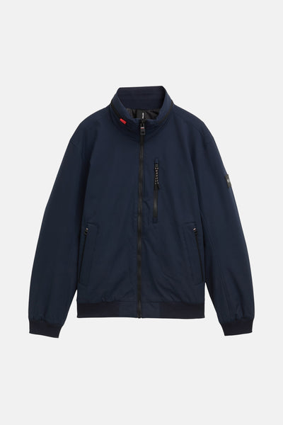 Veste courte bleue de Tom Tailor avec fermeture éclair, poches zippées et logo sur la manche.