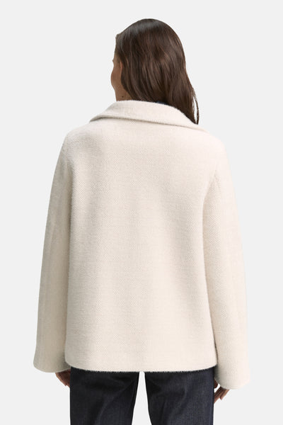 Veste courte beige de Tom Tailor, avec col tailleur et texture bouclée, vue de dos.