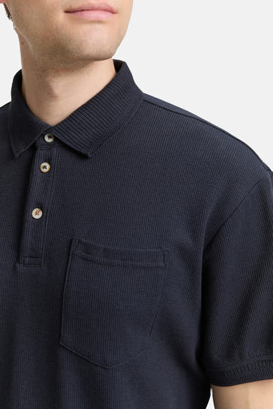 Blauw poloshirt met korte mouwen van Tom Tailor, in een getextureerd breisel met borstzak.