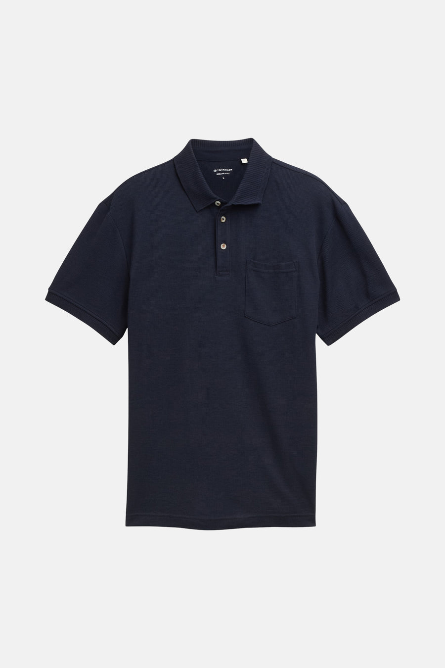 Blauwe polo met korte mouwen van Tom Tailor, met borstzak en wafelstructuur.