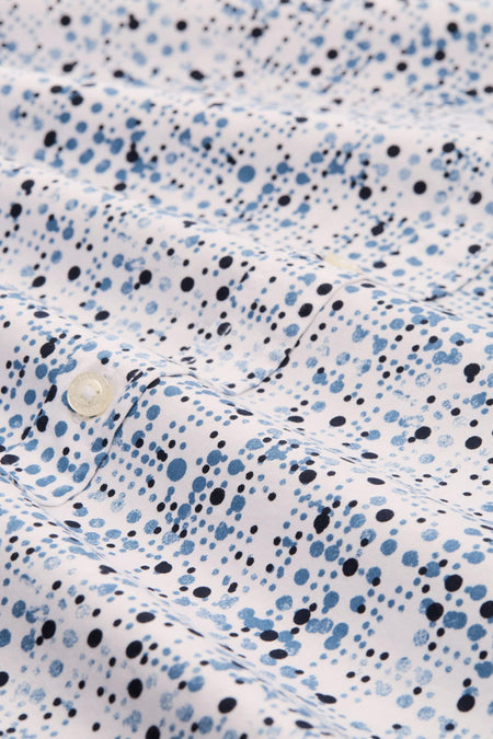 Chemise à manches longues bleue en coton de Tom Tailor, avec motif à pois et fermeture boutonnée.