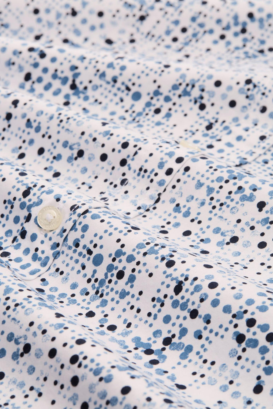 Chemise à manches longues bleue en coton de Tom Tailor, avec motif à pois et fermeture boutonnée.