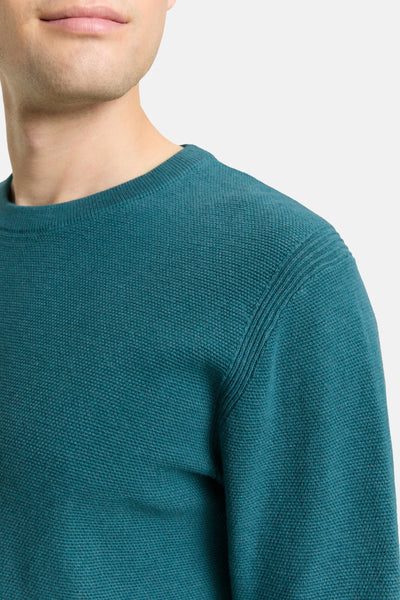Groene trui met ronde hals van Tom Tailor, met een wafelstructuur en geribbelde details op de schouders.