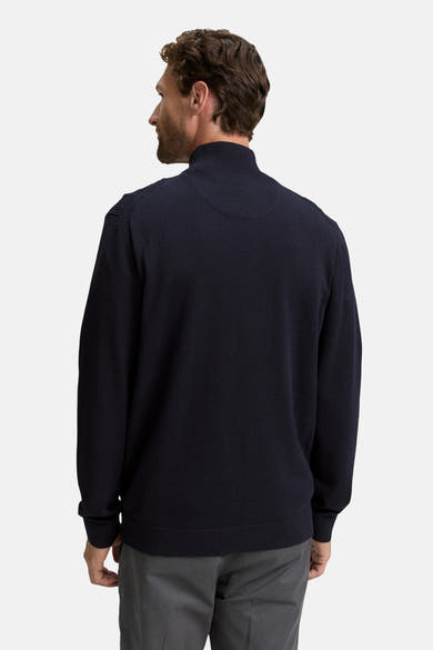Gilet bleu de Tom Tailor, col montant, manches longues et détails texturés aux épaules.