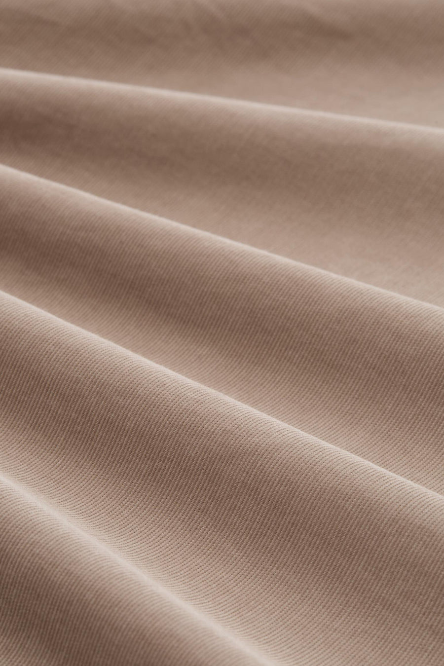 Beige blouse (lange mouwen) van Tom Tailor, fijn geribbelde textuur en zachte plooien.