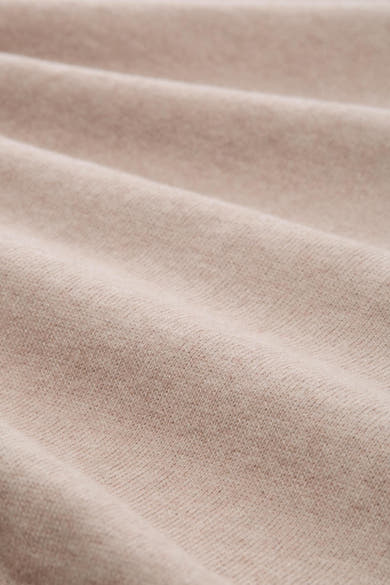 Pull beige de Tom Tailor, texture douce et plissée, en gros plan.