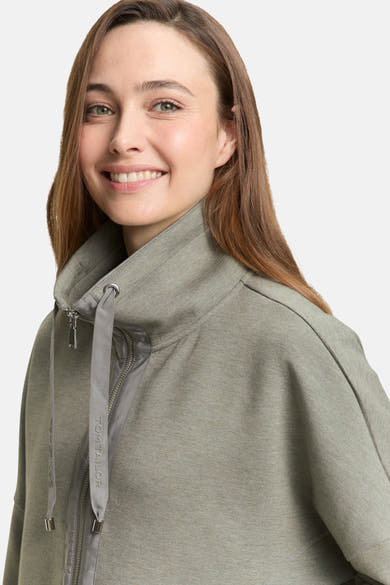 Cardigan kaki de Tom Tailor avec une fermeture éclair asymétrique et un col montant.
