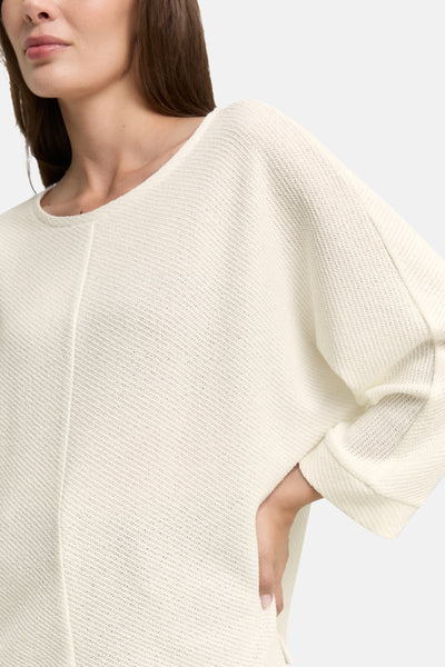 Sweat blanc col rond de Tom Tailor, avec une texture tricotée et une coupe ample.
