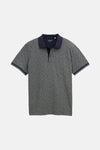 Multikleurig poloshirt met korte mouwen van Tom Tailor, met een complex abstract patroon en een licht gekreukte textuur.