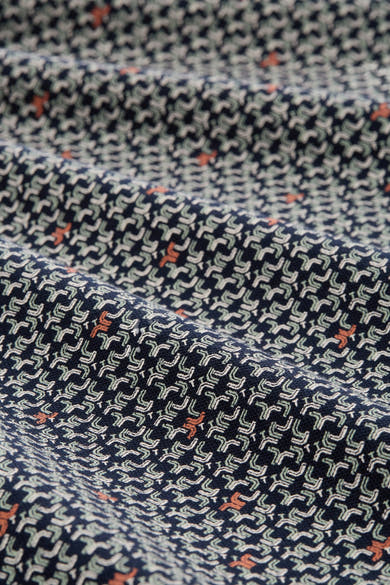 Polo multicolore à manches courtes de Tom Tailor, avec motif abstrait complexe et texture légèrement froissée.