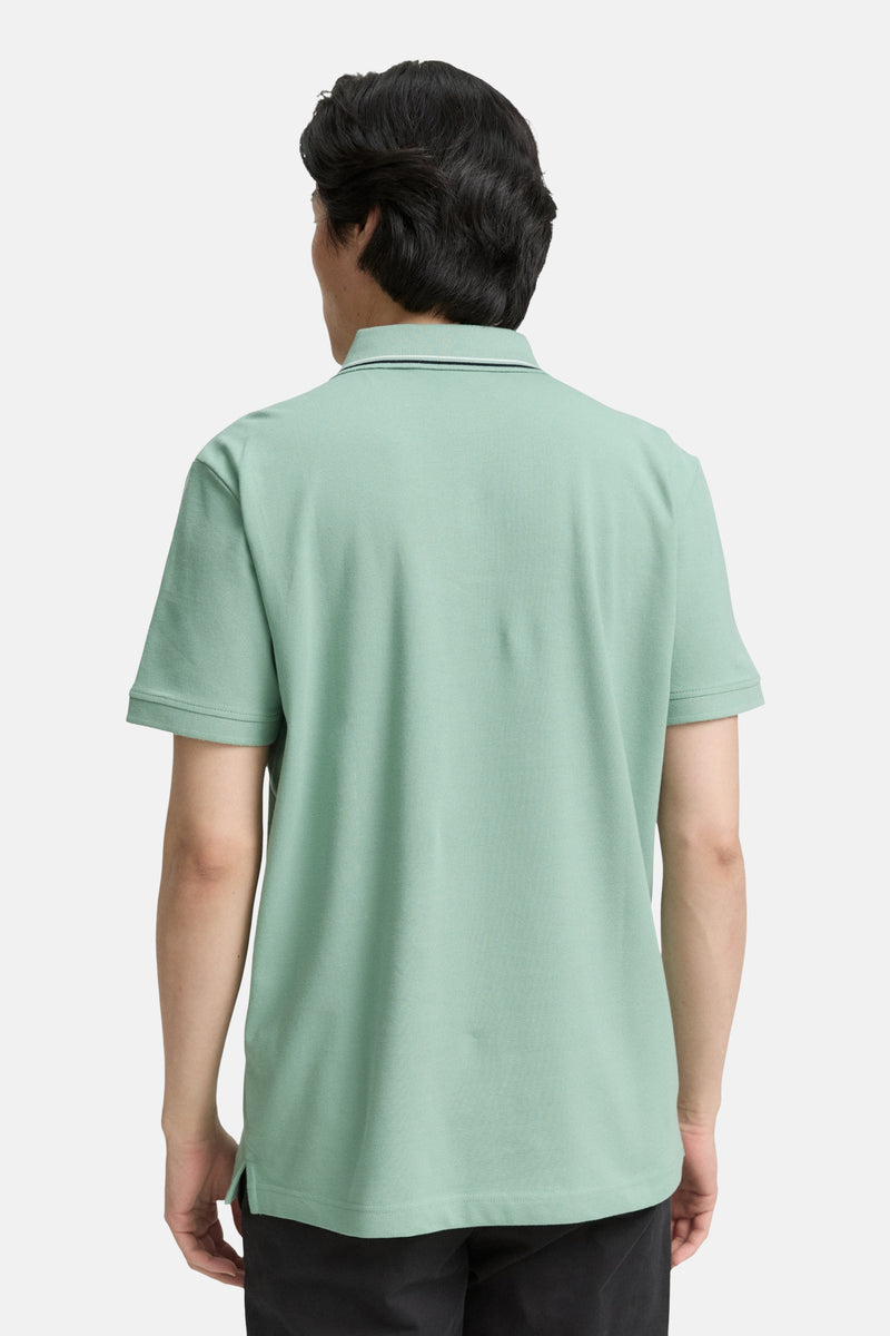 Piqué polo met print