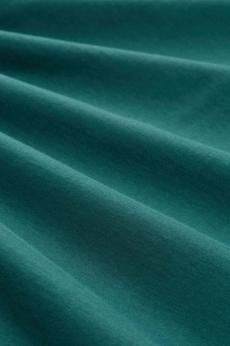Groen T-shirt met korte mouwen van Tom Tailor, getextureerde stof met zachte plooien.