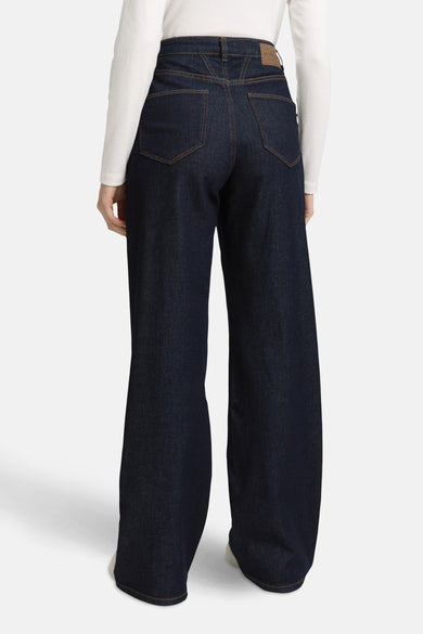Wijde spijkerbroek in donkerblauw denim van Tom Tailor, met achterzakken en zichtbare naden.