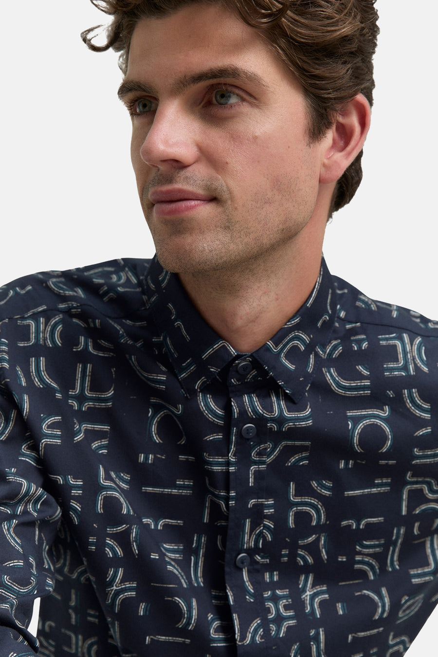 Blauwe blouse met lange mouwen van Tom Tailor, met een abstract geometrisch patroon over het geheel.