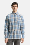 Chemise à manches longues bleue de Tom Tailor, à carreaux avec poche poitrine sur fond uni.