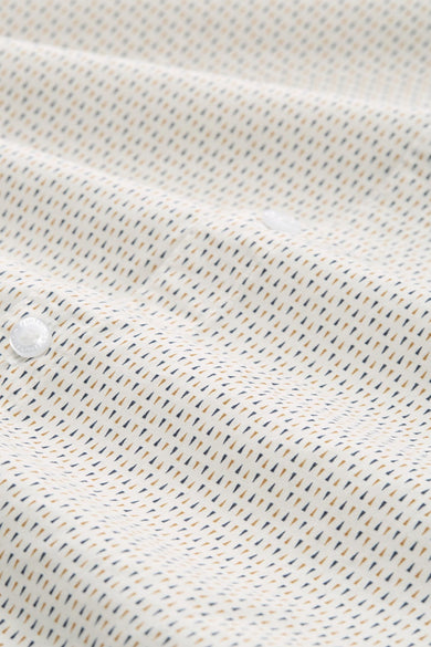 Chemise à manches longues multicolore de Tom Tailor, avec motif triangulaire discret et boutons blancs.