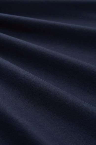 Blauw poloshirt met korte mouwen van Tom Tailor, effen textuur met subtiele plooien.