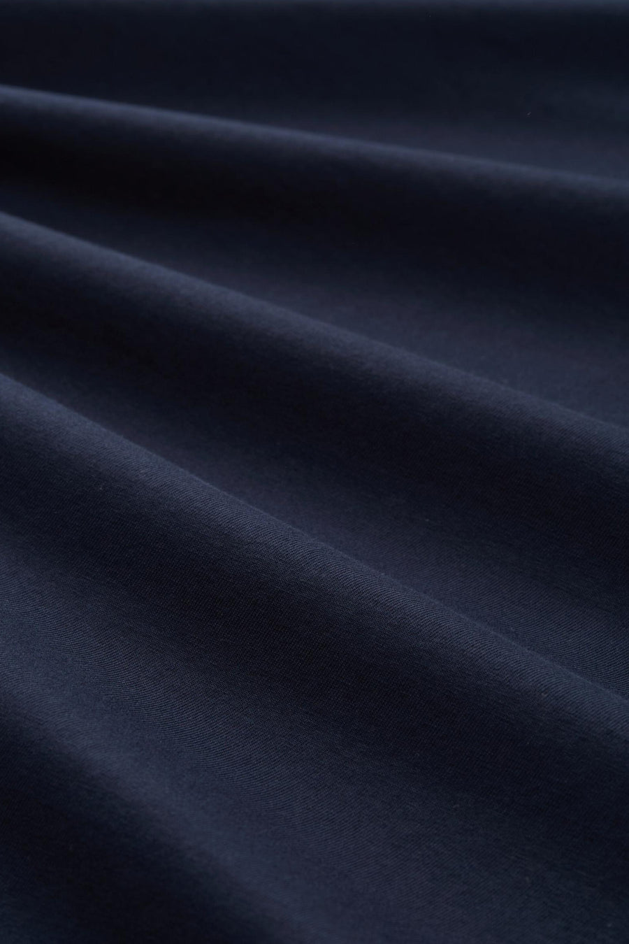 Blauw poloshirt met korte mouwen van Tom Tailor, effen textuur met subtiele plooien.
