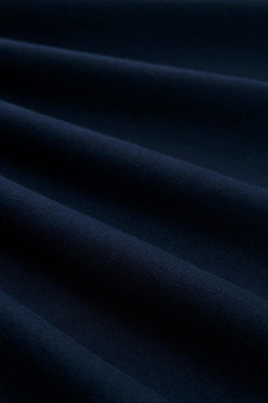 Blauwe sweater van Tom Tailor, van getextureerde stof met delicate plooien.