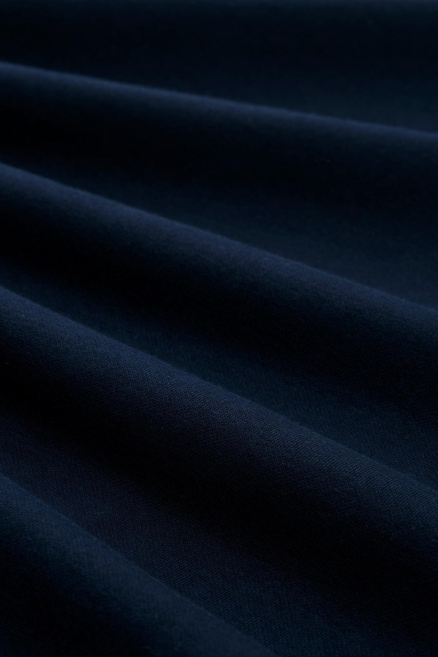 Blauwe sweater van Tom Tailor, van getextureerde stof met delicate plooien.