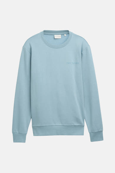 Blauwe sweater van Tom Tailor, met een ronde hals en subtiel geborduurd logo op de voorkant.