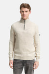 Ecru coltrui van Tom Tailor, met gespikkeld textuur, van achteren gezien, gedragen met een grijze jeans.