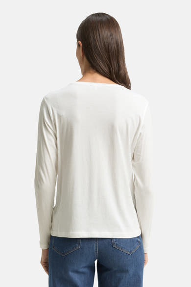 T-shirt à manches longues blanc de Tom Tailor, porté avec un jean, vue de dos.
