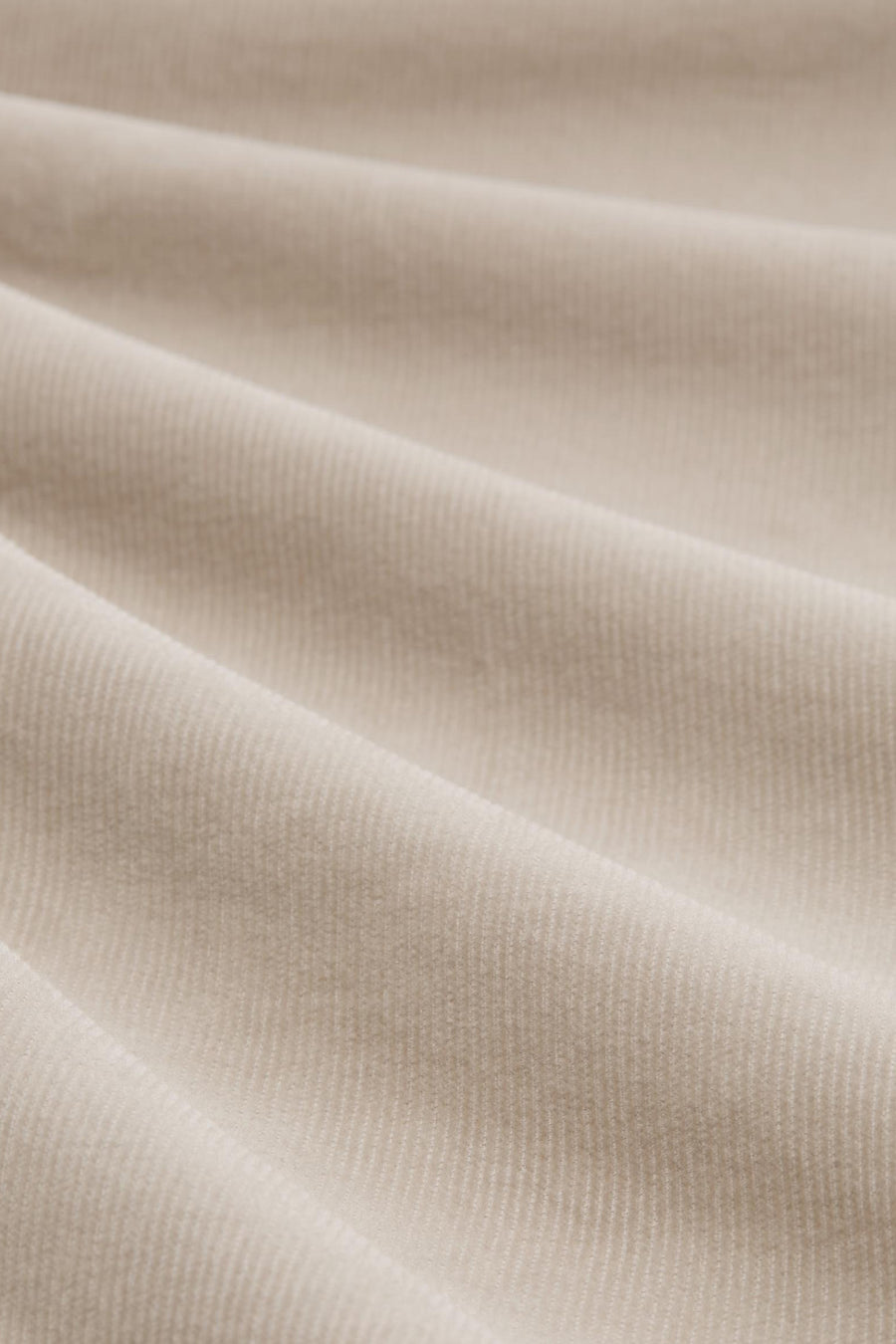 Beige corduroy trousers by Tom Tailor, with soft pleats and a rich texture.