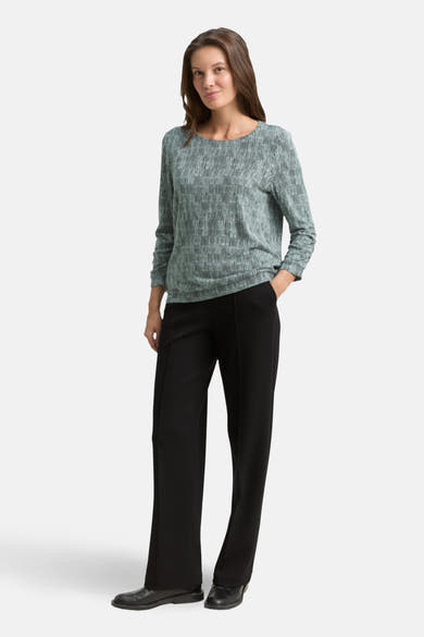 T-shirt à manches longues vert de Tom Tailor, avec motif rayé vertical et pantalon noir.