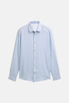 Chemise à manches longues bleue de Tom Tailor, avec une texture subtile et des boutons ton sur ton.