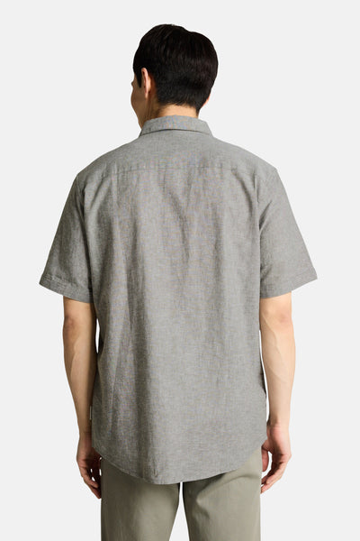 Kaki short-sleeve chemise with textured fabric, back view showing relaxed fit and curved hemline